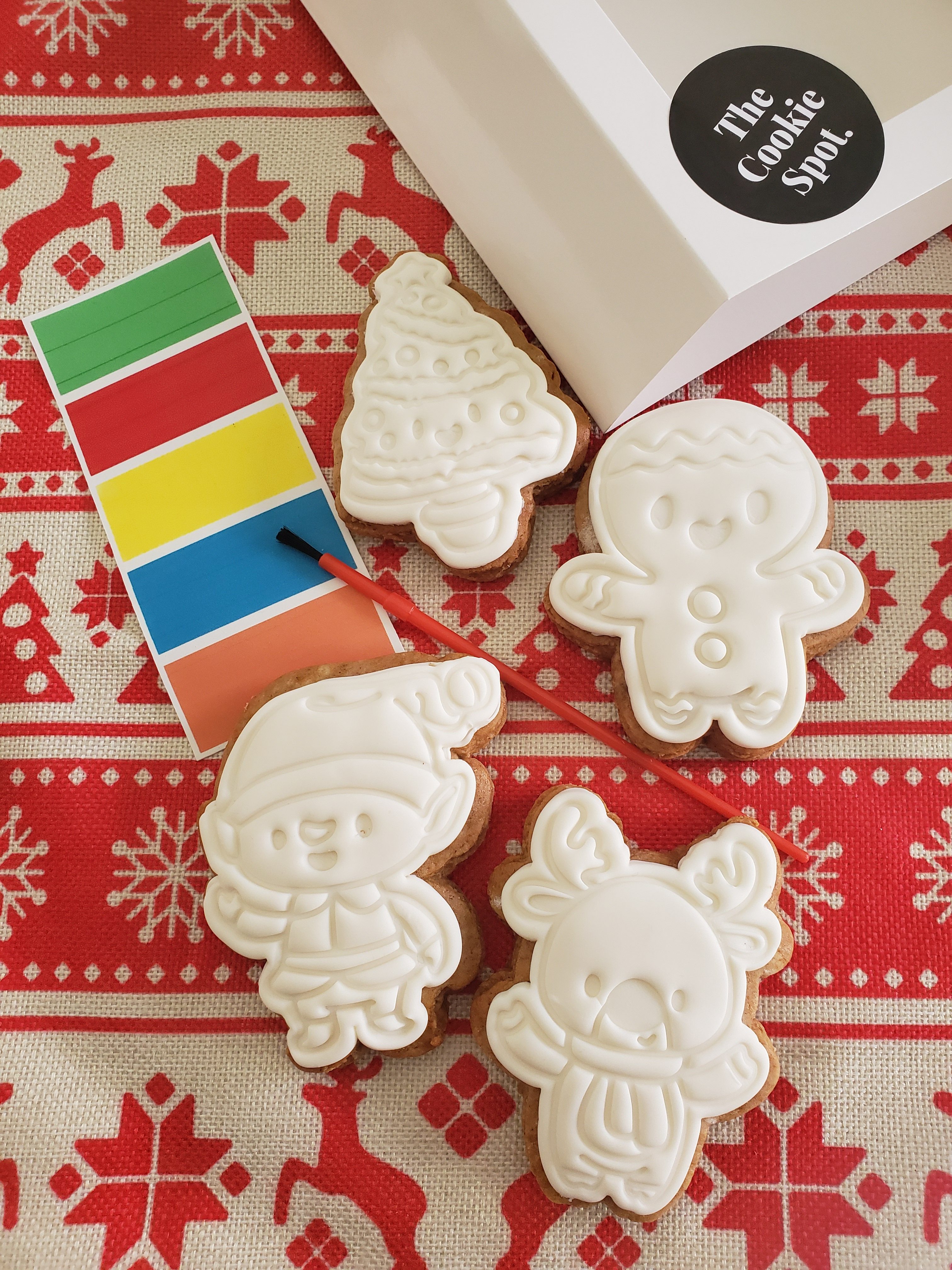 Individual paint your own cookie party favours wrapped with brush